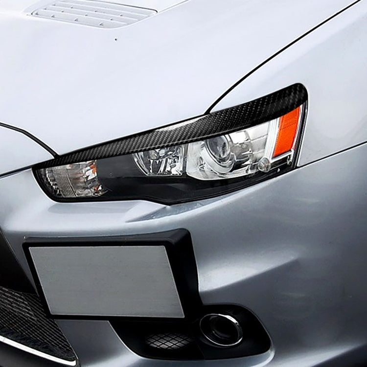 2 PCS / Set Carbon Fiber Car Lamp Eyebrow Decorative Sticker for Mitsubishi Lancer EVO 2008-2014, Drop Glue Version